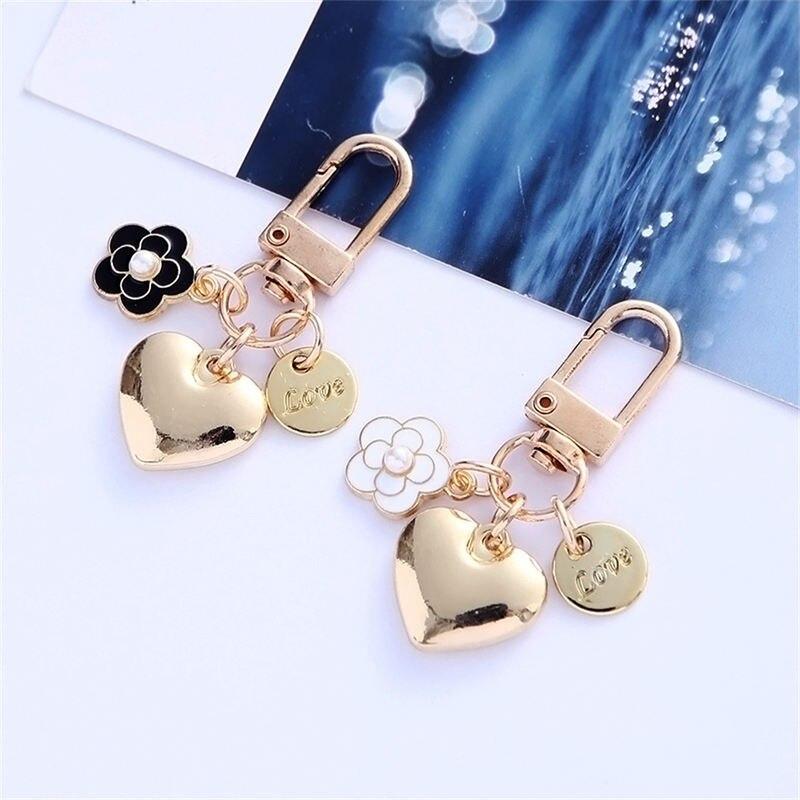 New Metal Heart Keychain Fashion Camellia Letters Round Pendant for Women Girls Headphone Case Accessorie Bag Trinket Party Gift