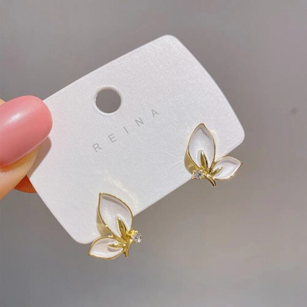 Golden Rimmed Crystal Butterfly Stud Earrings - Image 2