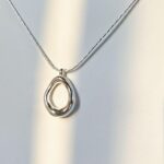 Geometric Hollow Water Droplet Necklace: Fashion Accessory for Women