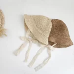 Chic Straw Baby Girl Hat: Elegant Summer Accessory with a Lace Bow Detail