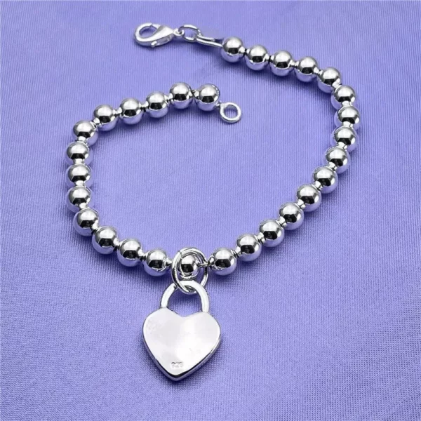 Elegant 925 Sterling Silver Heart Charm Bracelet for Women - Image 4